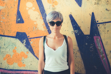 young beautiful short blue hair hipster woman