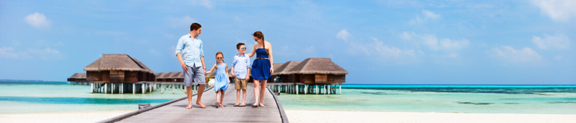 Obraz premium Family on luxury beach vacation