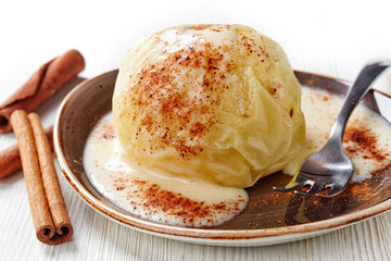 baked apple with vanilla sauce