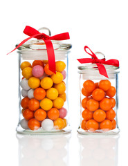 Colorful background of assorted Gumballs in  glass jar,  isolate
