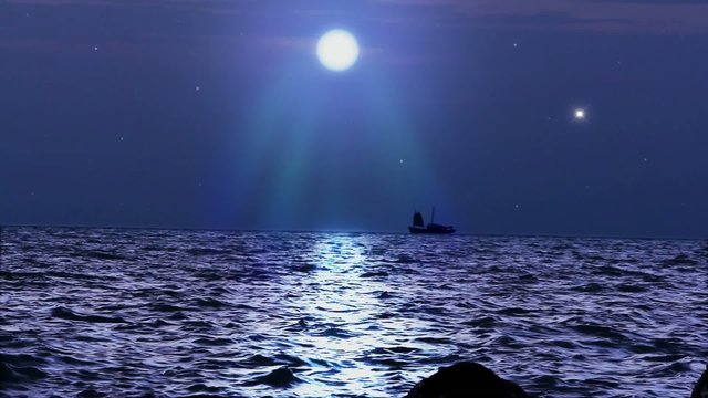 Ship sails under the moon in magical night on Koh Samui