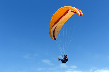 Paraglider flying above Mediterranean near Arsuf, Israel.