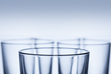 detail of a group of empty water glasses
