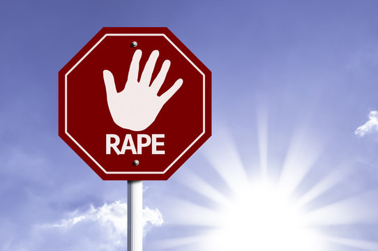 Stop Rape red sign with sun background