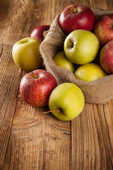 Fresh harvested apples on wood