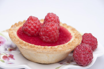 Tartlet of shortcrust pastry    with raspberry jelly and raspber