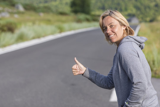 woman hitchhiking
