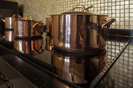 Copper Cookware On The Stove