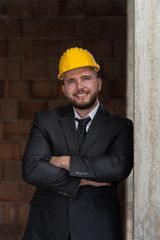 Caucasian Male Construction Manager With Arms Folded