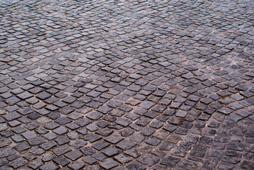 gray and wet paving slabs