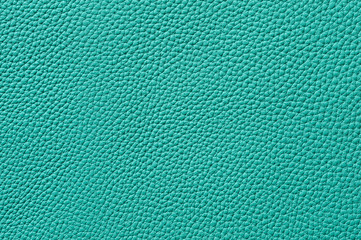 Closeup of seamless green leather texture