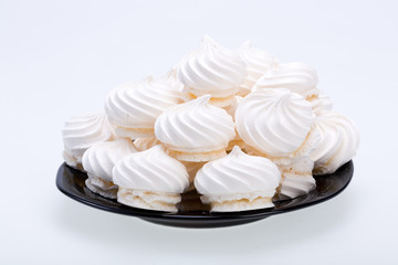 French vanilla meringue cookies on white background