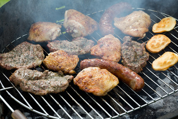 barbecue with delicious grilled meat on grill