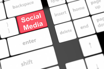 Social media concept on keyboard background