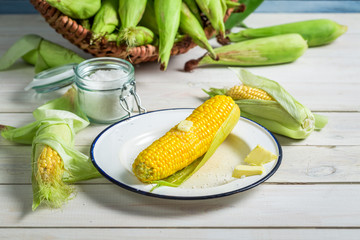 Fresh hot corn with butter