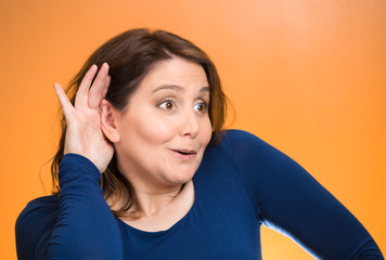 Nosy woman listening to someone's conversation eavesdropping 