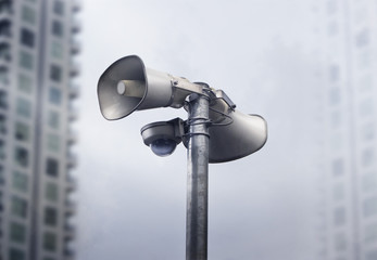 CCTV Camera and warning speaker in the big city