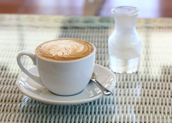 coffee on white table in cafe