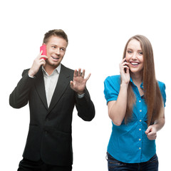 happy smiling business people calling by mobile telephone