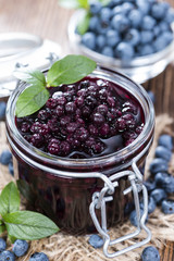 Glass with canned Blueberries