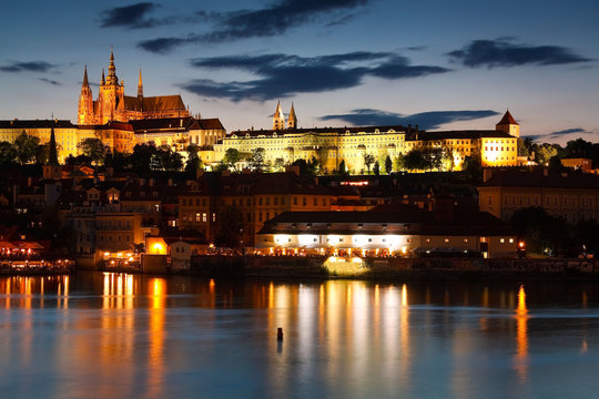 Old town of Prague as seen over river Vltava.