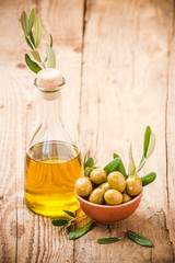 Olives on rustic table in a bowl