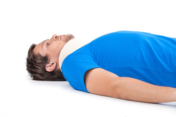 Fototapeta na wymiar young man lying with cervical collar.