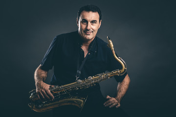 Naklejka premium musician with saxophone