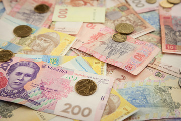 New bright ukrainian hrivnas money banknots and coins background