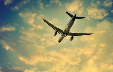 Airplane takes off into cloudy sky