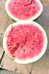 Slices of watermelon on wooden table