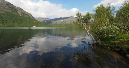 Naklejka na ściany i meble Lake in the mountain. Panorama