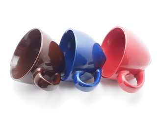 colorful cups on white background