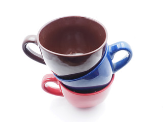 colorful cups on white background