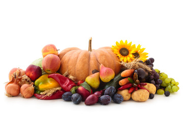 Naklejka na ściany i meble Autumnal fruits and vegetables isolated on white.