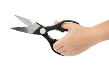 Hand holding scissors