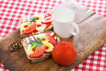 Healthy breakfast, sandwich and tomato from above