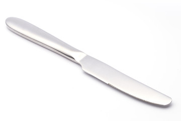 Steel metal table knife on white background