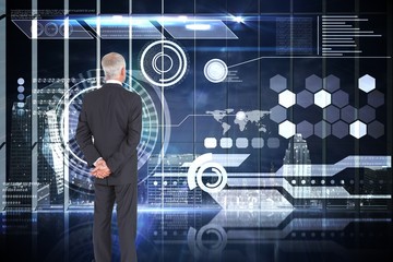 Composite image of rear view of mature businessman posing
