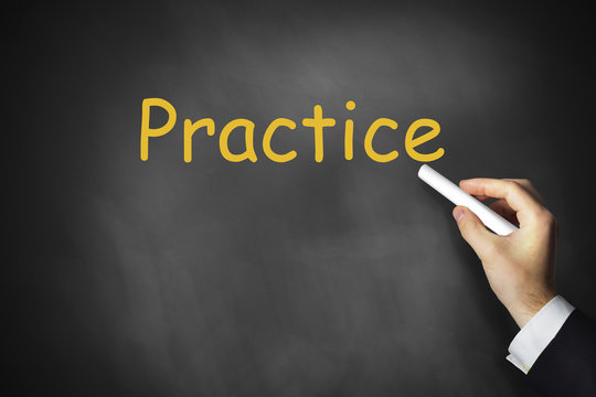 hand writing practice on chalkboard