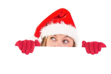 Festive blonde holding a poster