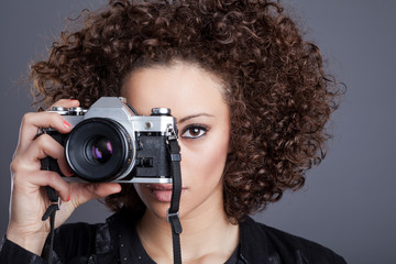 Woman photographer with camera