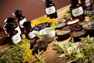 Medicine bottles and herbs 