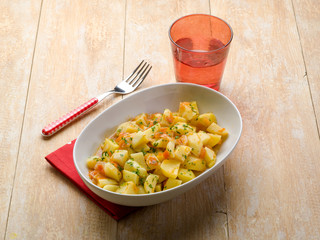 potatoes salad with tomatoes and parsley