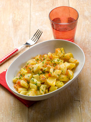 potatoes salad with tomatoes and parsley