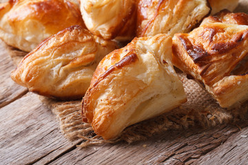 Pies of puff pastry close up horizontal - obrazy, fototapety, plakaty