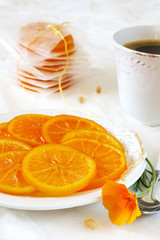 Candied fruits: slices of oranges and coffee