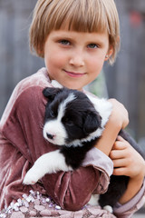 Little girl with the puppy
