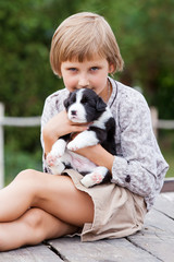 Little girl with the puppy