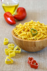 Ingredients Italian cuisine: macaroni and tomatoes